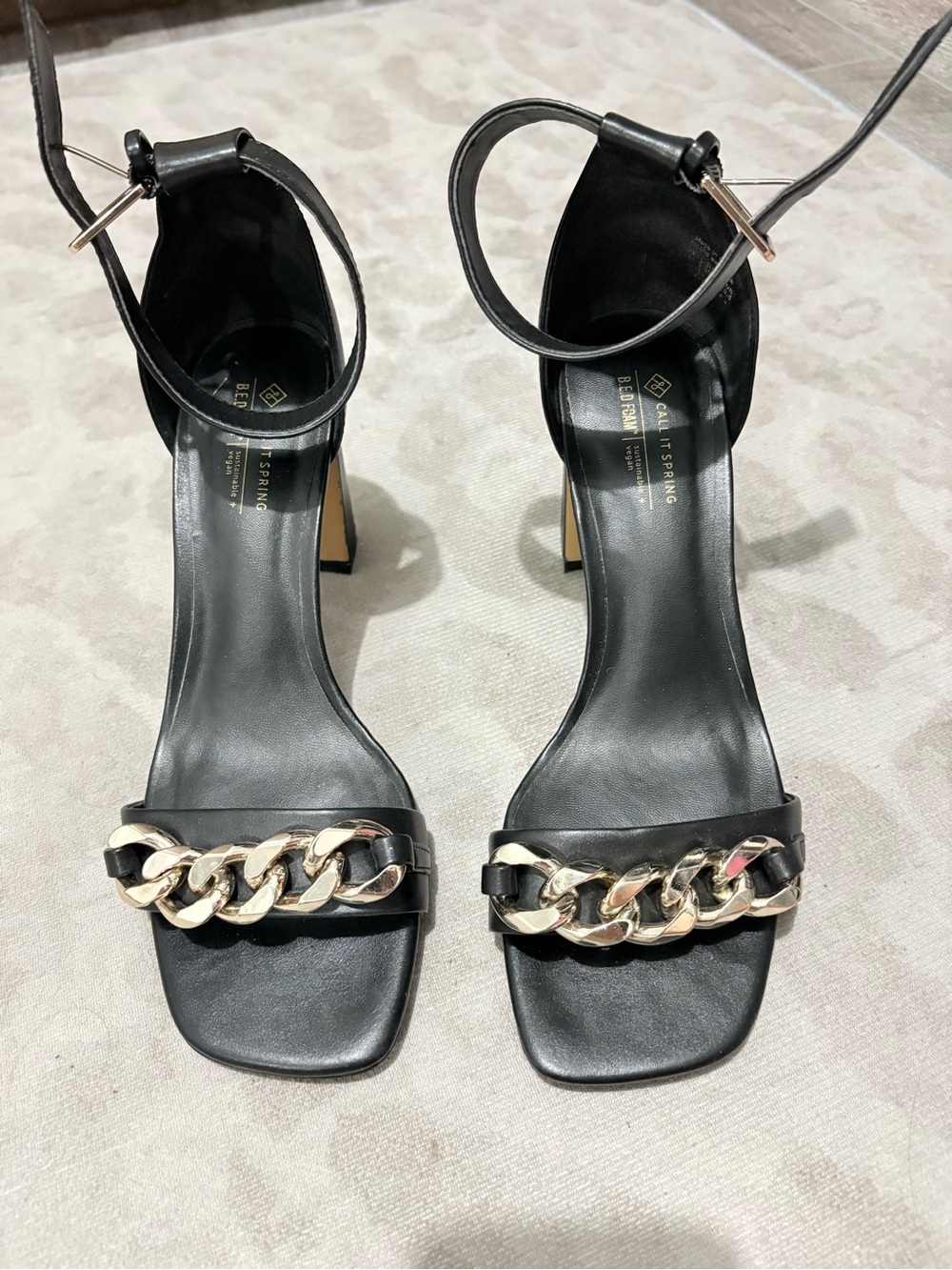 Call It Spring Black Ankle-Strap Heels with Gold Chain Accent
